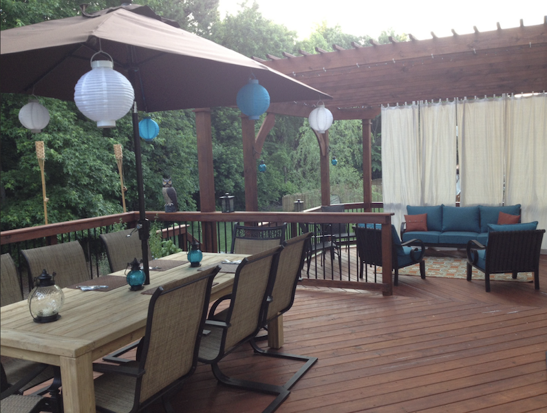 Deck with blue and white lanterns and trellis