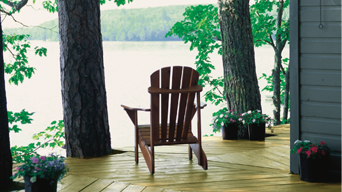 adirondack chair on Ecolife deck on lake